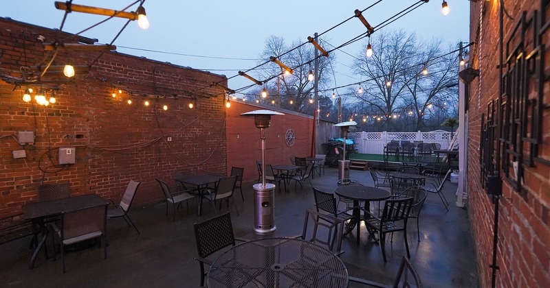 Exterior, patio with guest tables and chairs