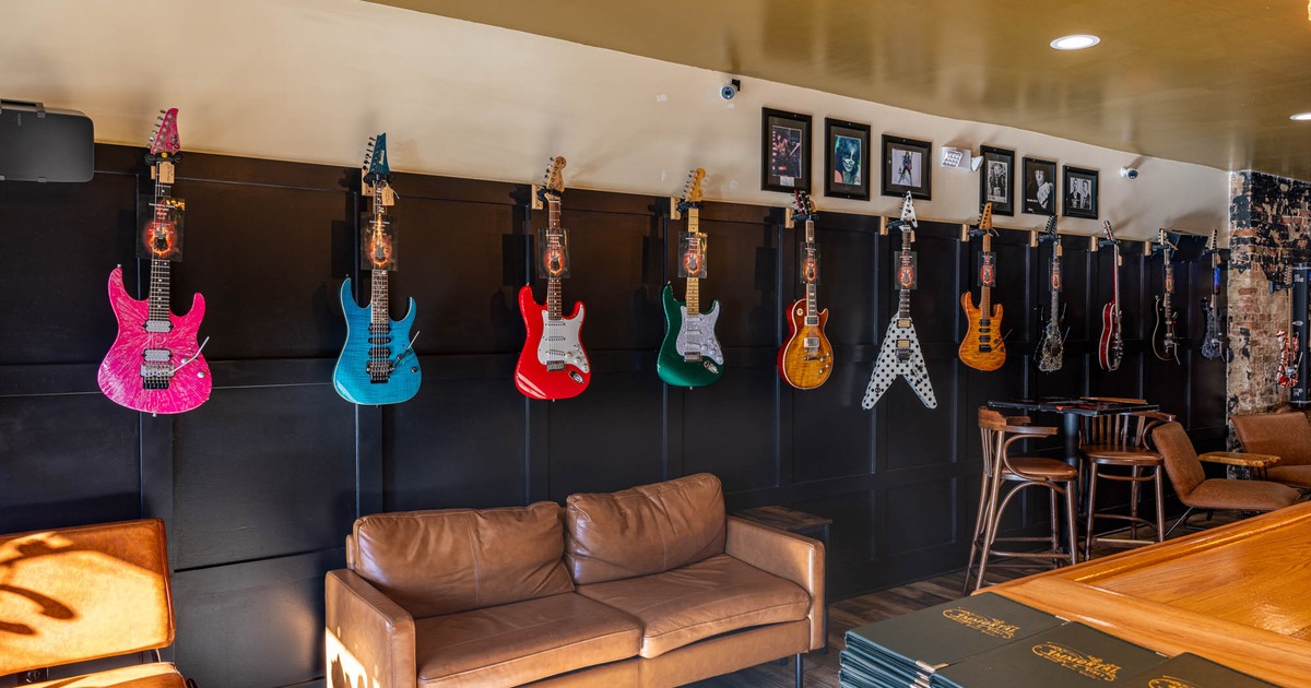 Lounge seating area, guitars on the wall