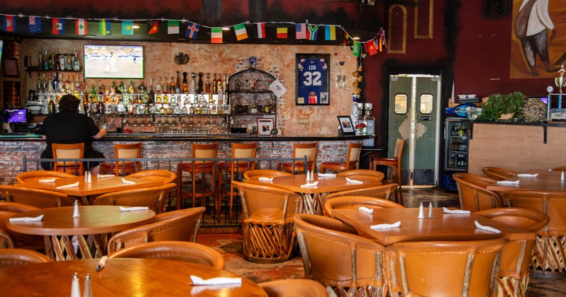 Interior, seating area with a bar in the back