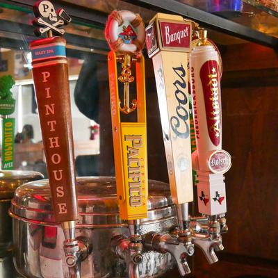 Assorted beer taps.