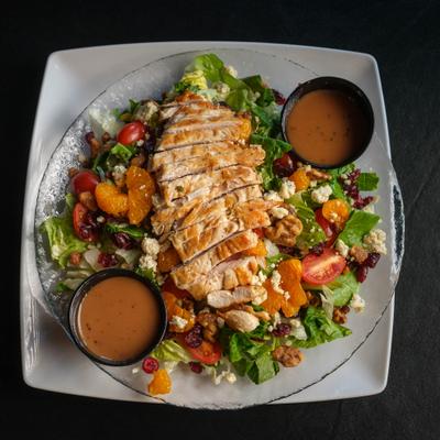 Goodfella’s Salad with mandarin oranges, walnuts, cheese crumbs and chicken.