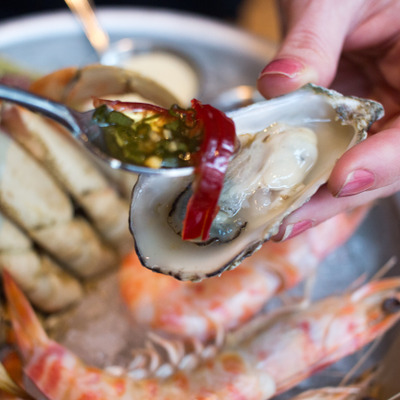 Preparing an oyster to be slurped