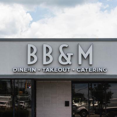 The restaurant's name above the entrance.