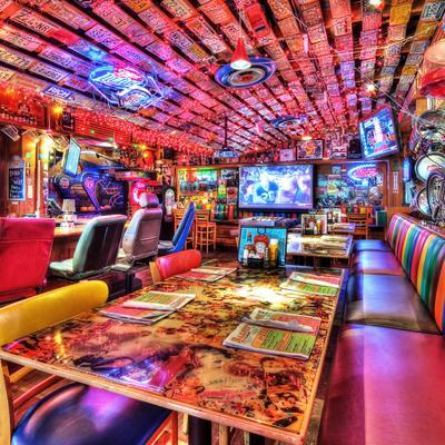Colorful diner interior with vibrant lighting and eclectic decor
