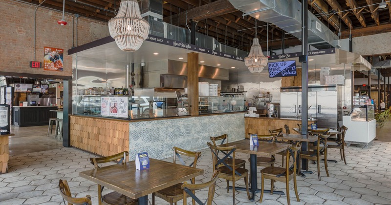 Interior, chairs and tables near bar area