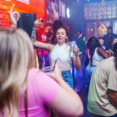 The dance floor with lots of guests.