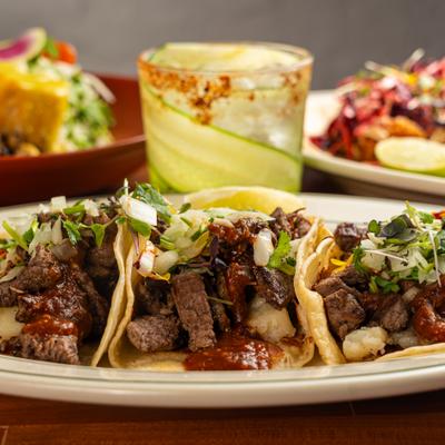 Meals and a cocktail, closeup.