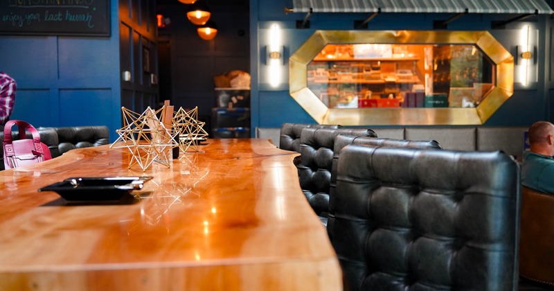 Wooden table and leather chairs