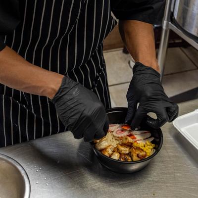 Chef preparing a dish.