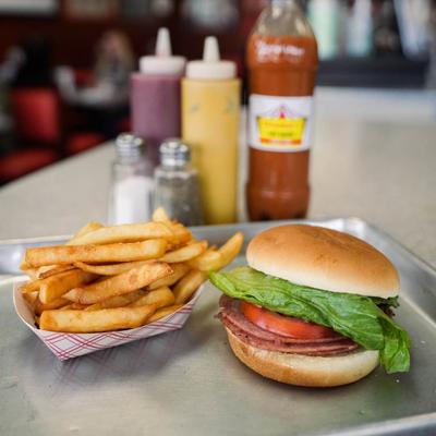 A tray with Taylor pork roll and fries.