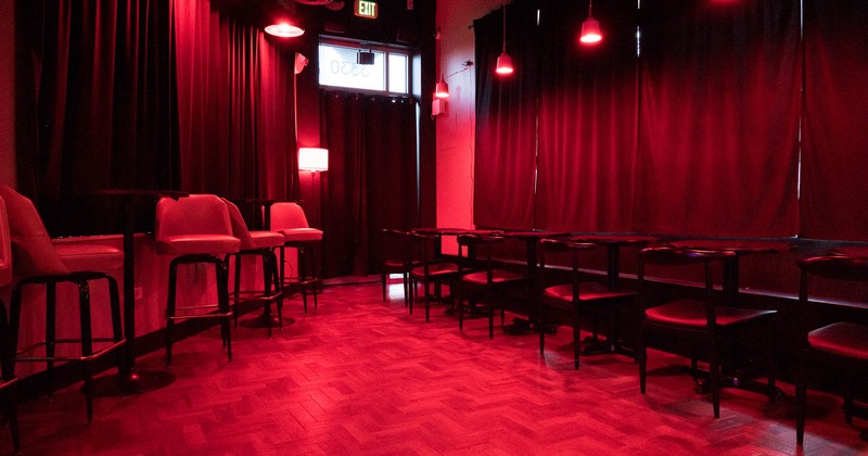 Interior, high seating tables with stools, regular tables for two with banquette bench