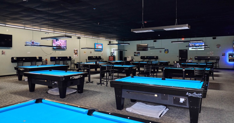 Interior seating area with pool tables