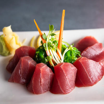 Red sushi, vegetables in the middle