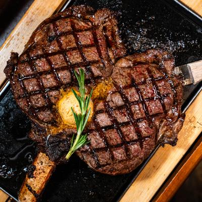 Butterflied Cowboy steak, top view.