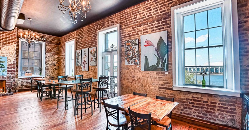 Interior, tables and chairs near window