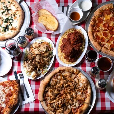 A top view of a table filled with food and drinks.