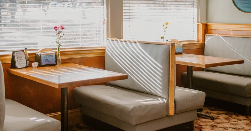 Interior, restaurant booth next to the window