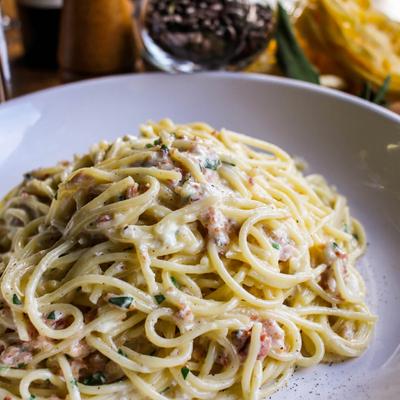 Spaghetti Carbonara, smoked bacon, cream, Parmigiano and egg