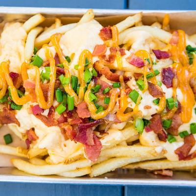 Fries, vegetables, dip and bacon