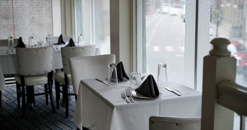 Interior, fully set table by the window