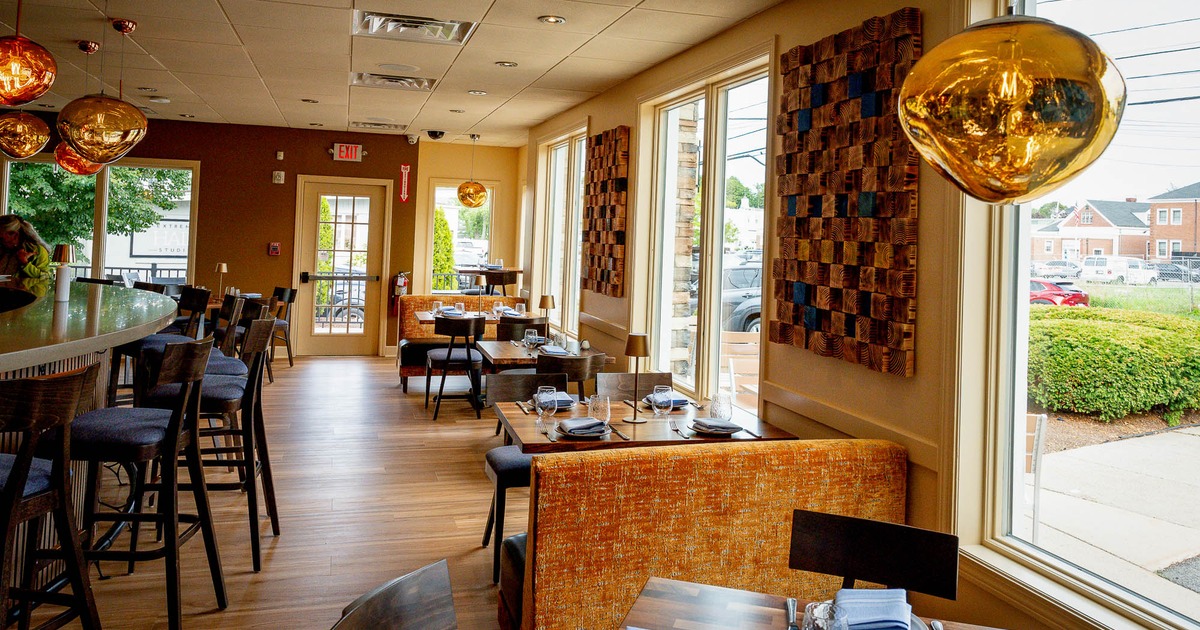 Interior, tables and chairs ready for guests