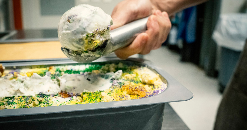 Staff member preparing food