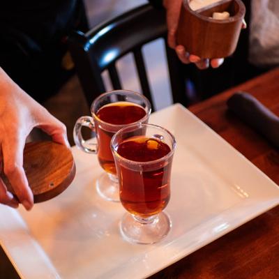 Tea served in clear glass cups.