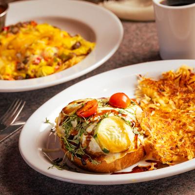 Caprese Avocado Toast, with Big Rig Breakfast Bowl and a mug of coffee in the background.