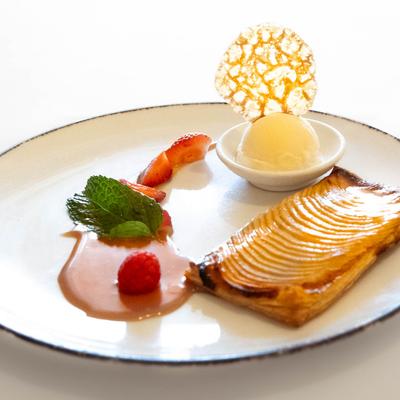Tart with apples, and vanilla ice cream.
