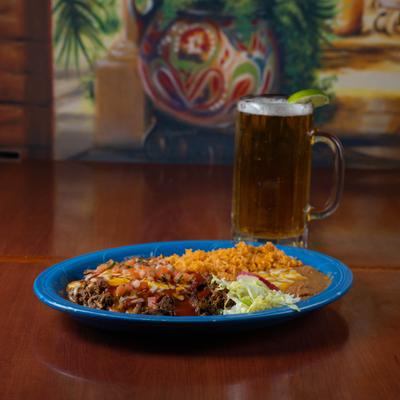 Machaca Beef dish and a glass of beer