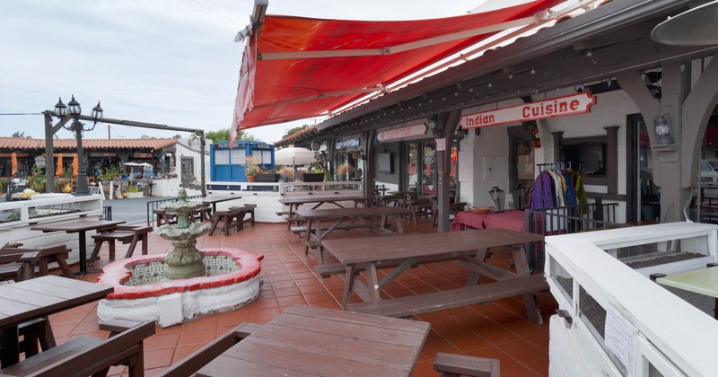 Outdoor seating area with picnic tables