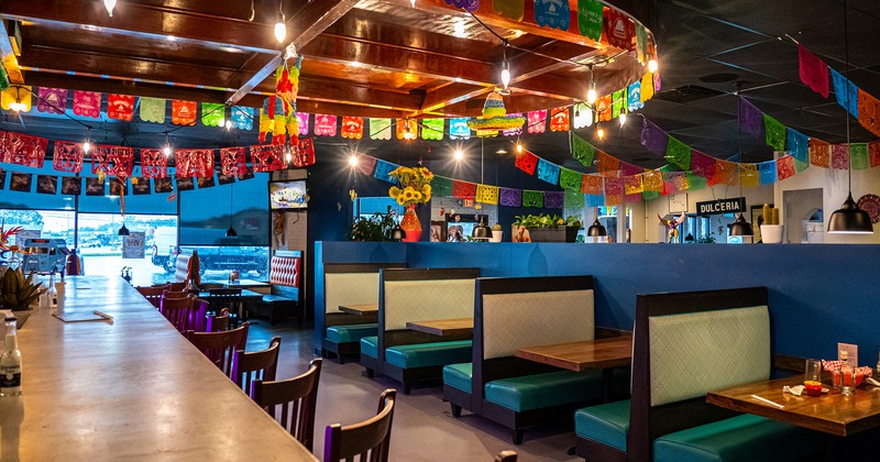 Dining booths lined up near the bar