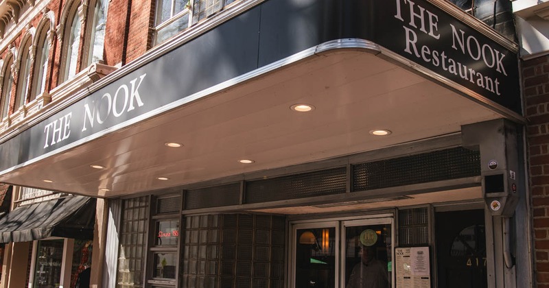Exterior, angle view to entrance to restaurant, side walk