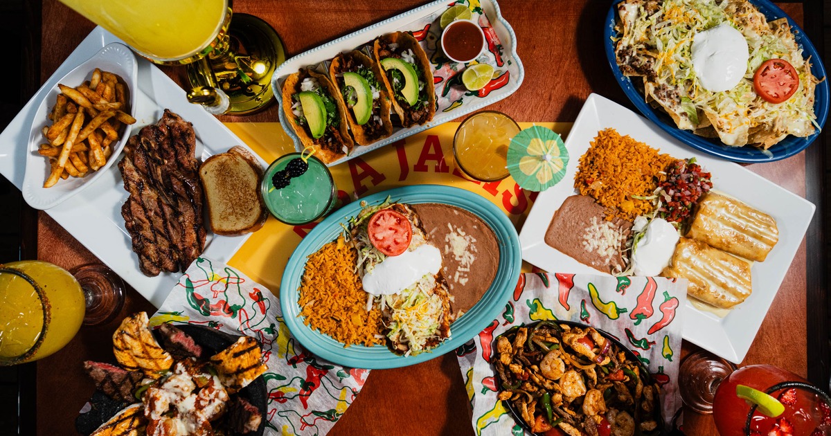 A large spread of various dishes and drinks from Casa Jalisco