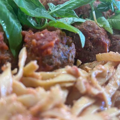 Pasta and meatballs for the dinner table.