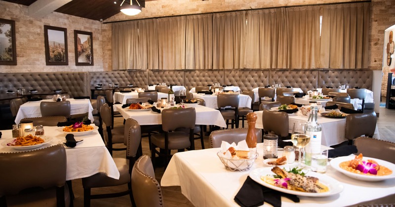 Interior, main seating space, tables ready for guests