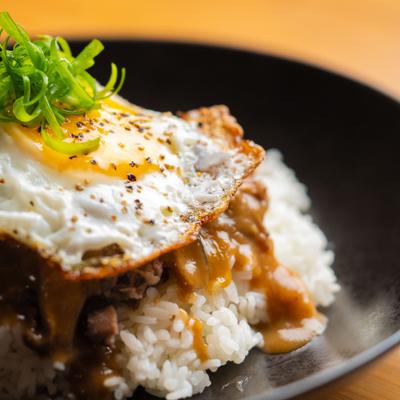 Loco Moco bowl, topped with fried egg.