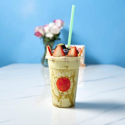 Avocado Juice, topped with berries.