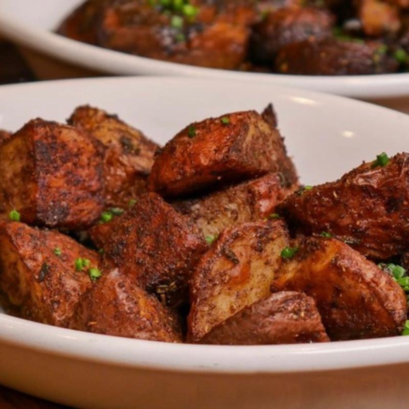 Jerk roasted red potatoes with chives photo