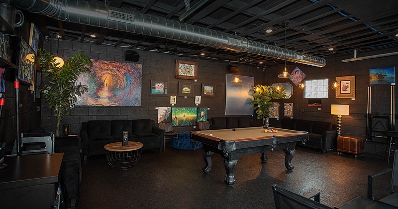 Interior, wide view of seating area, pool table