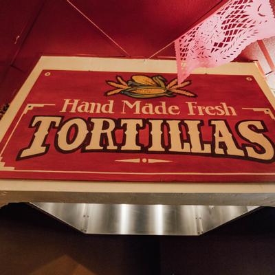 Signage reading Hand Made Fresh Tortillas