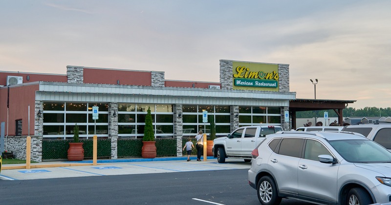 Exterior, front view to restaurant, entrance, parking lot
