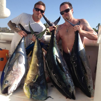 Two guys with four caught fishes