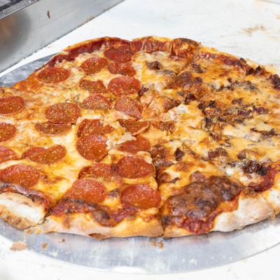 Half-pepperoni and half-meat topping pizza.