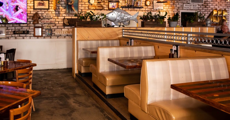 Interior, booth seating area on the right