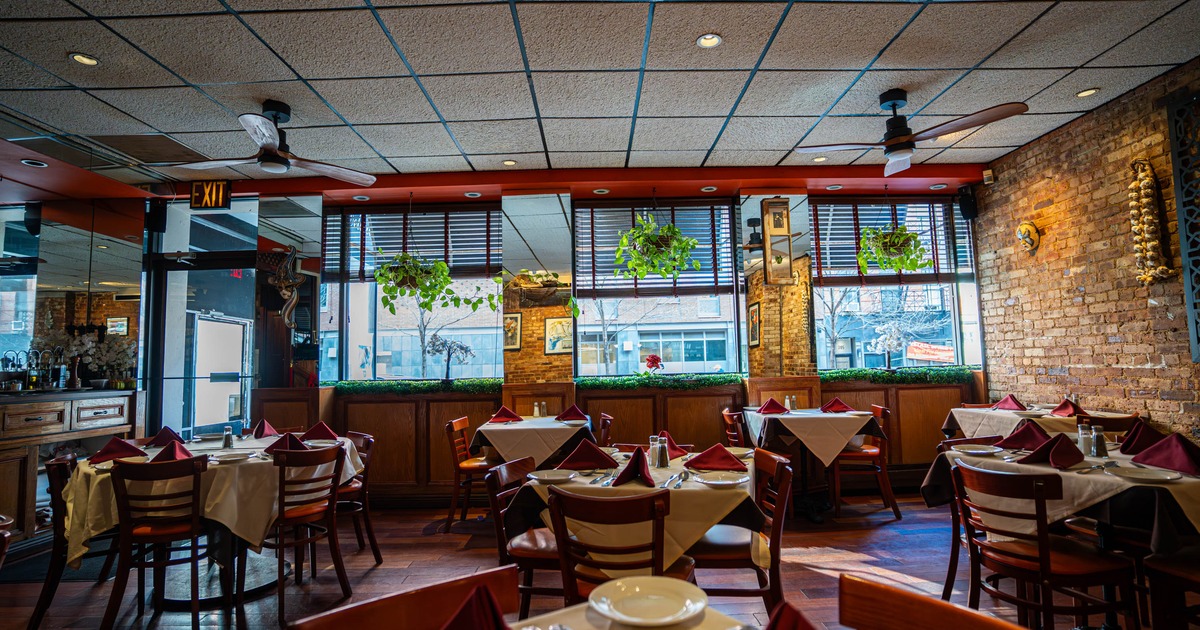 Interior, tables and chairs ready for guests