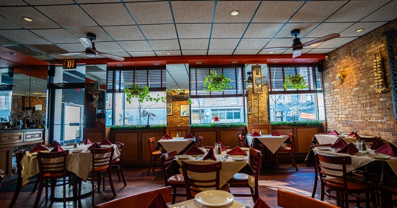 Interior, tables and chairs ready for guests