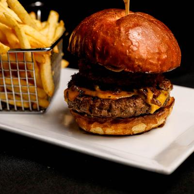 Mushroom cheeseburger and fries.