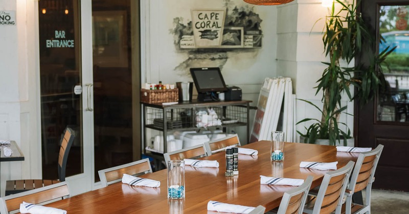 Exterior, table set for guests on patio