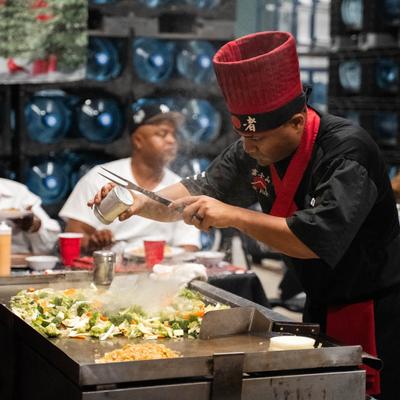 Chef grilling vegetables.